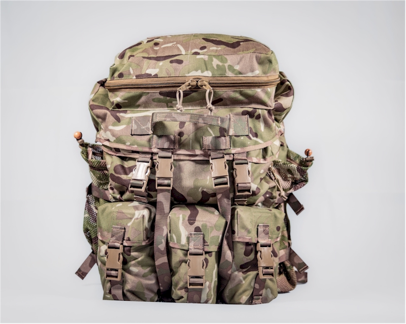 Triple utility pouches along the bottom and a basha stash above