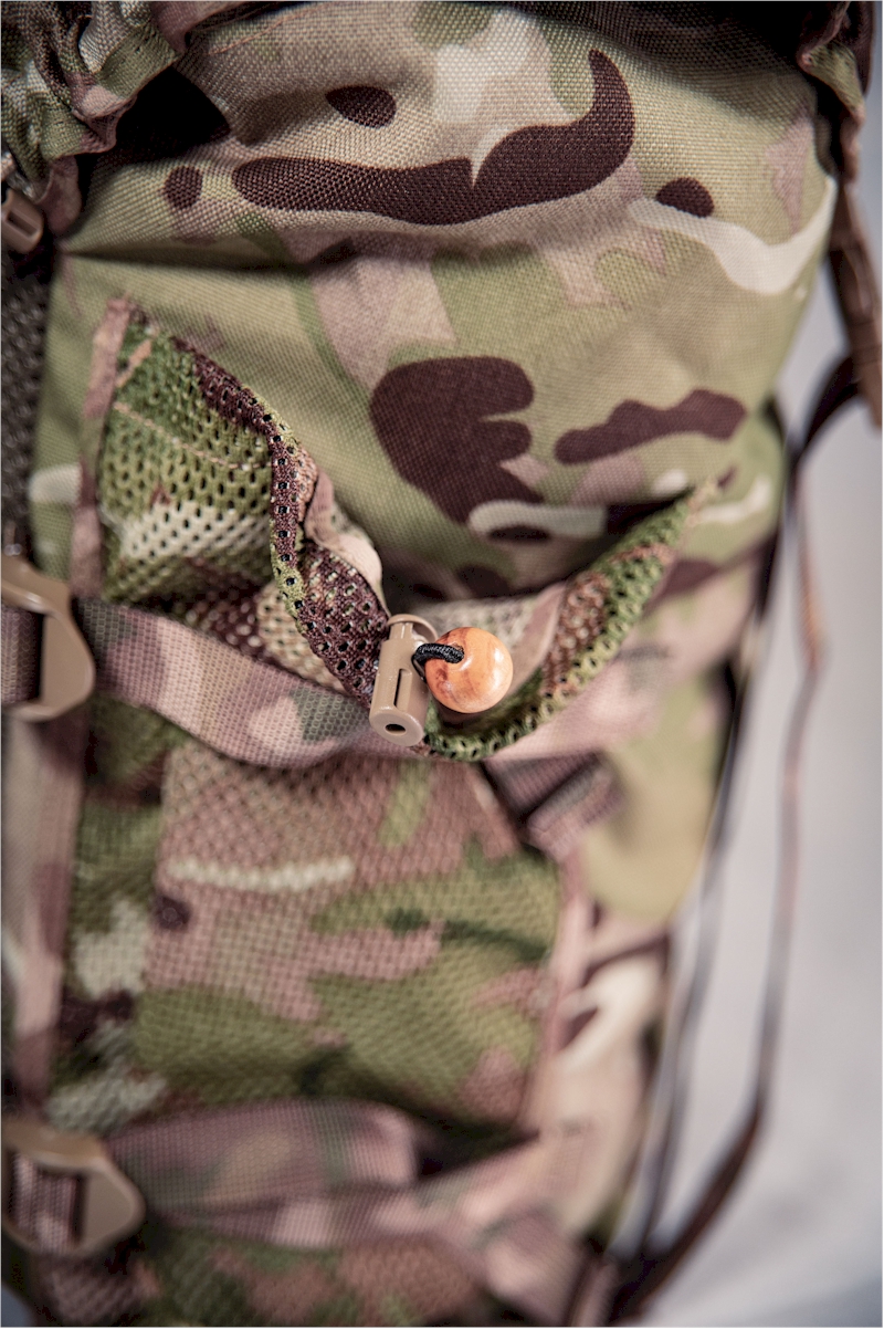 Shock cord and cordloc for extra security on the side pockets