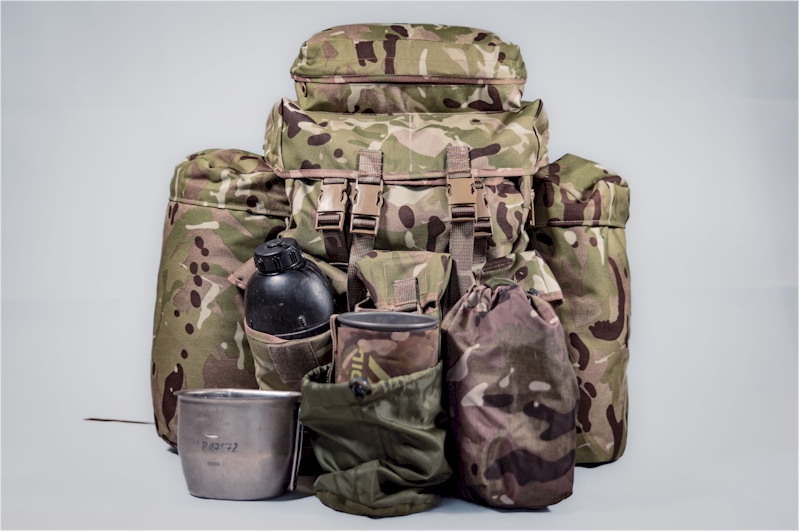 Utility pouches and basha stash on the front